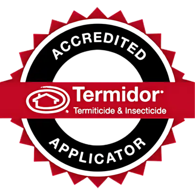 Red circular seal logo with a jagged edge and a red banner across the center reading 'Termidor' (termite and insecticide brand).