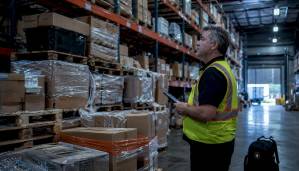 1784547402820_Warehouse-manager-inspecting-inventory-for-pest-damage - Arsenal Pest Control - Arsenal Pest Control Warehouse manager inspecting inventory for pest damage